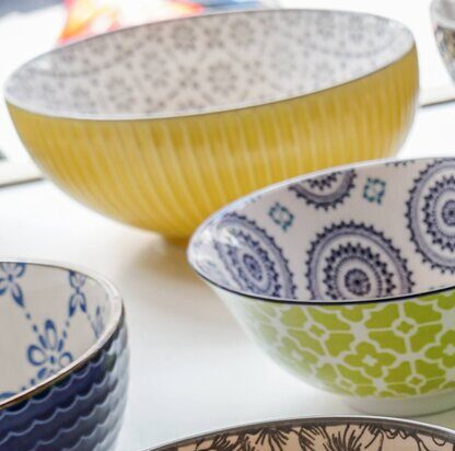 A close up picture of some colorful bowls